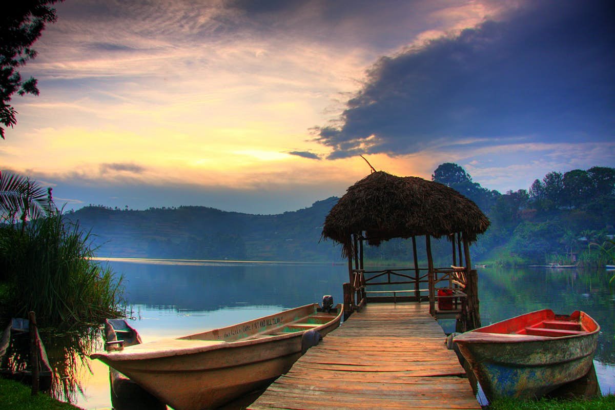 a view of a lake and canoes