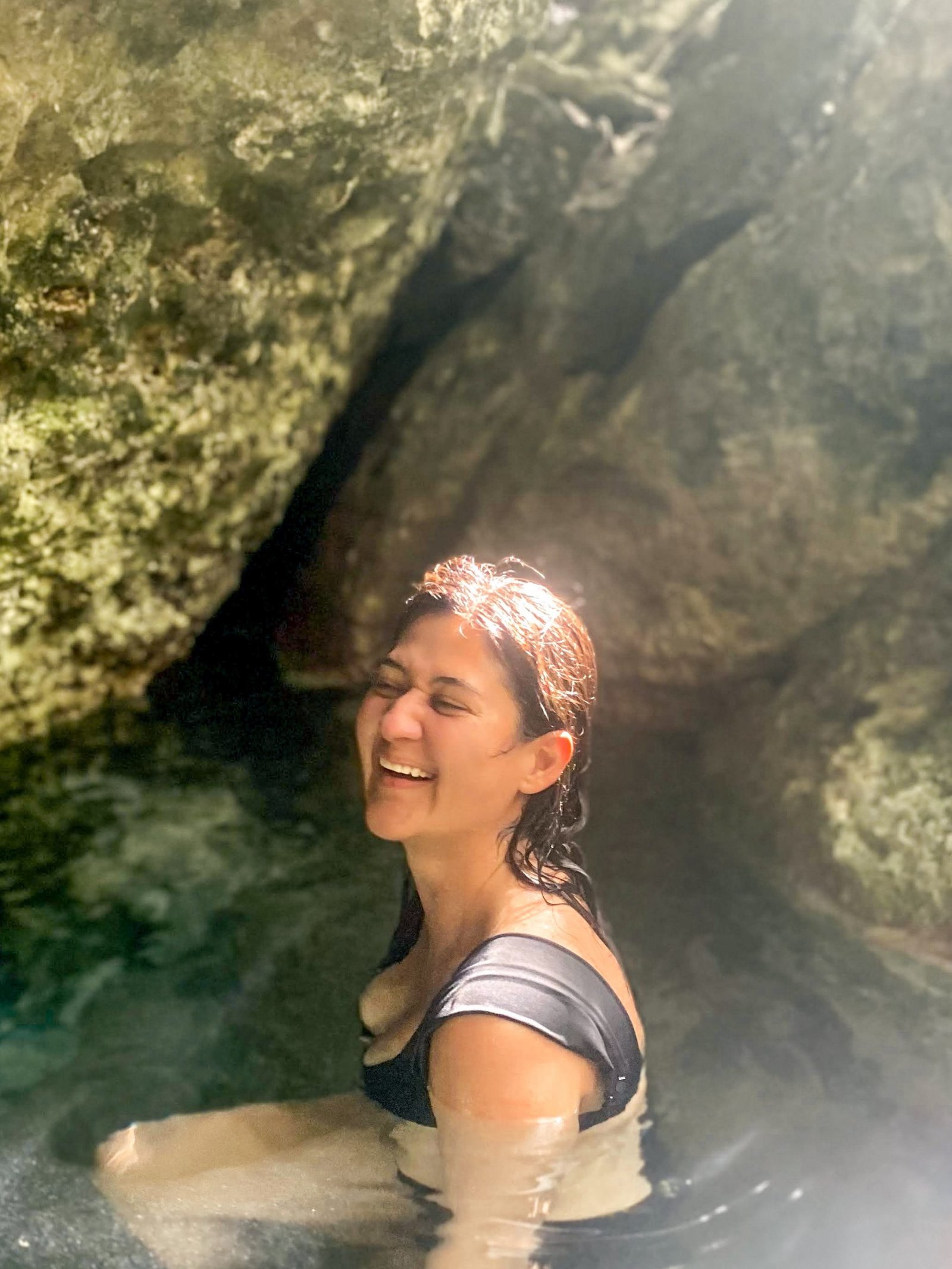 a woman posing in the water