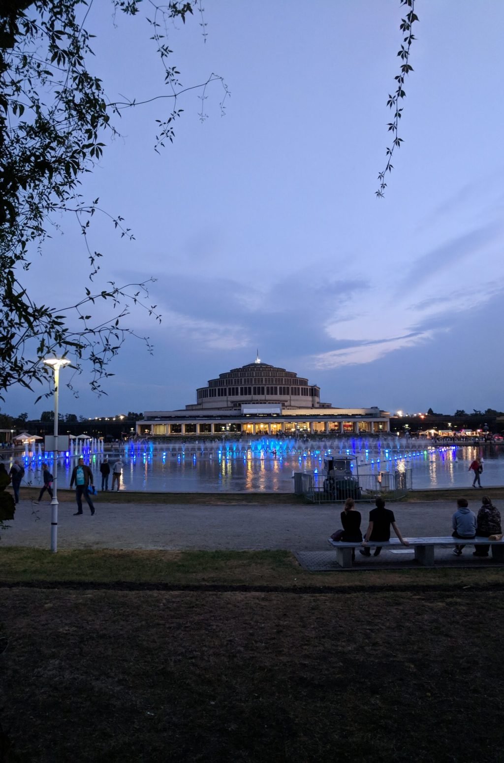 a 3-day itinerary in wrocław | people walking around the Centennial Hall's multimedia fountain